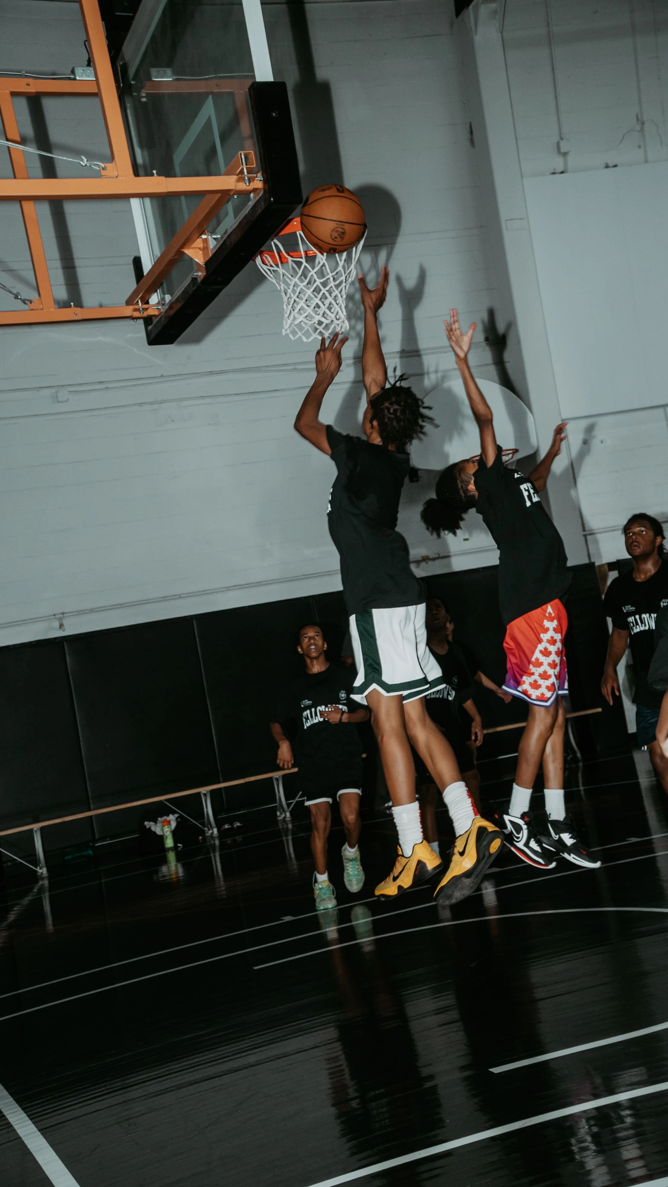 people playing basketball